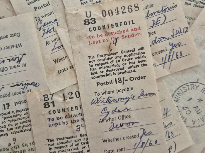 Image of a pile of postal order counterfoils, dating from 1960, from the collections of PRAAD Accra, RG 17/1/220