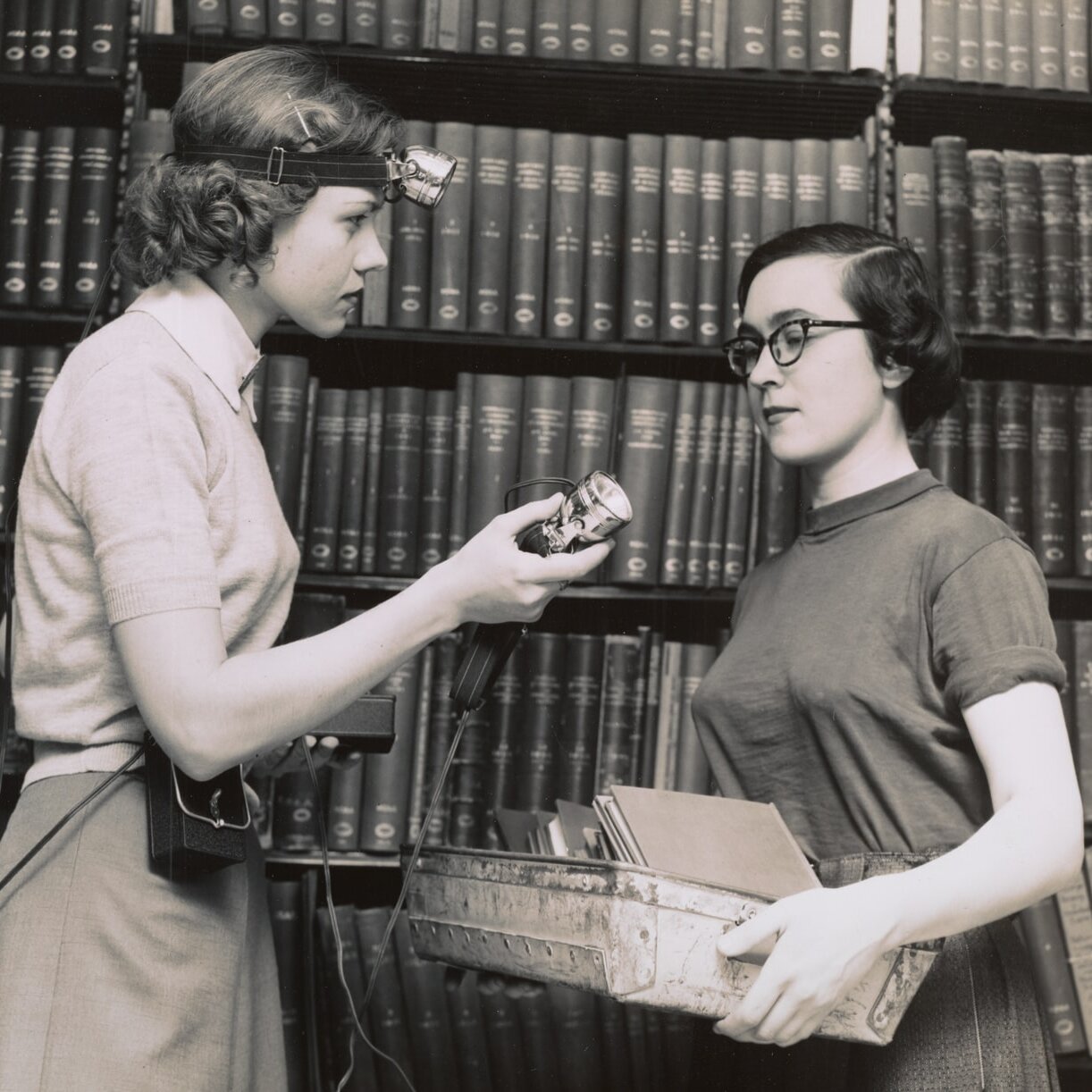 Stack maintenance at the New York Public Library, 1948 Black and white image of two female librarians carrying out stack maintenance at the New York Public Library in 1948