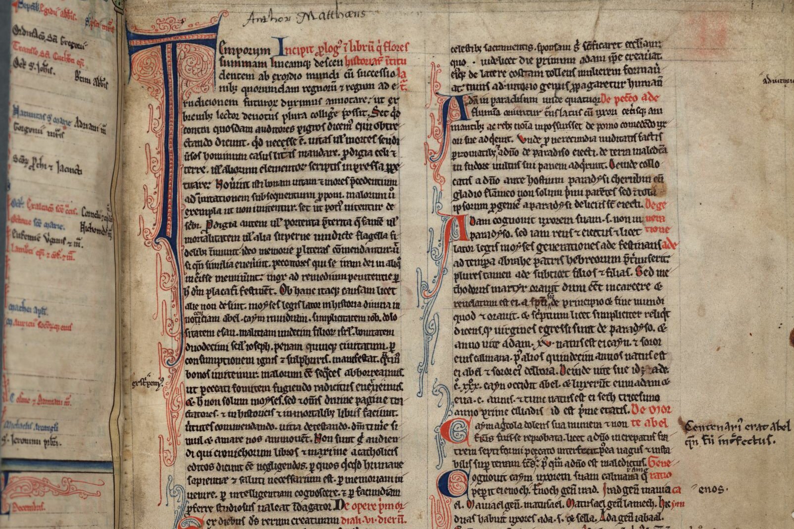Folio 1r of Matthew Paris, Chronica Maiora (Corpus Christi College, Cambridge, MS 61). The image shows a manuscript page. The text is written in black, with decorative initials in black or red, embellished with pale blue.