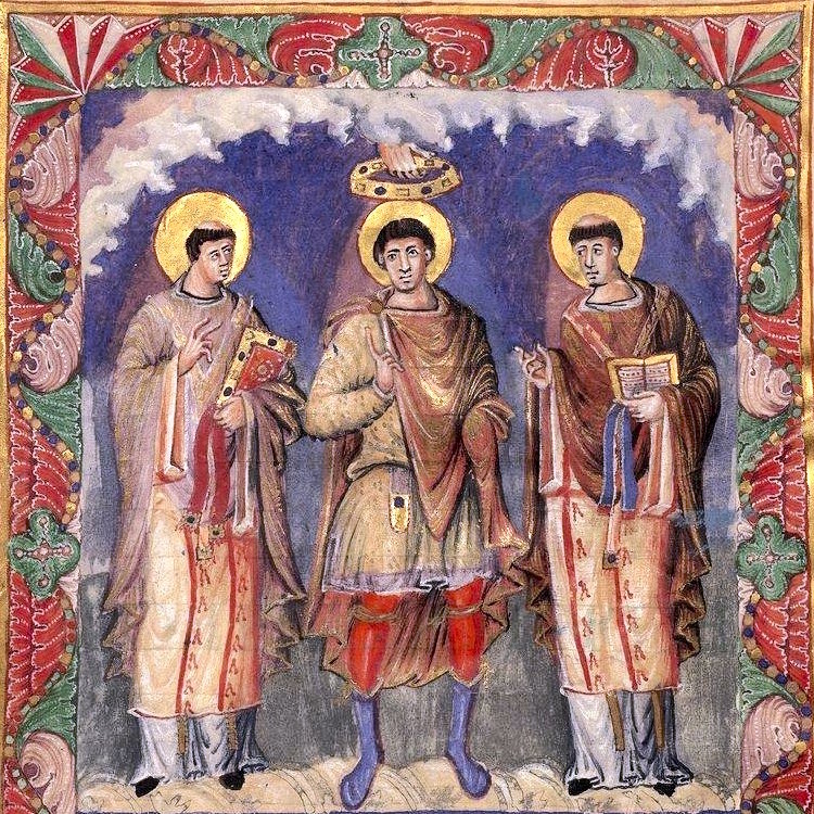 An illuminated image from the Sacramentarium of Charles the Bald, showing a group of three men, one of whom is being crowned by a hand that is descending from Heaven