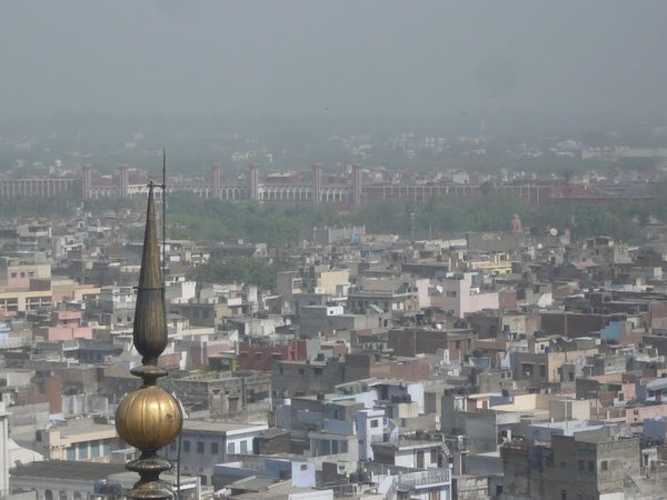 A picture of the rooftops and distant hazy skyline of Old Delhi