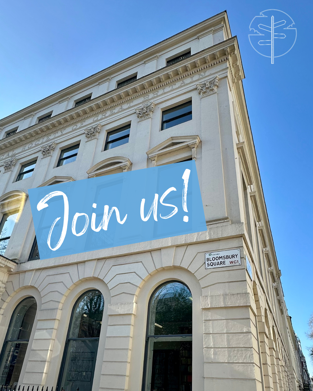 A pictor of the corner of the GHIL building under a bright blue sky with the words "Join Us!" written across.